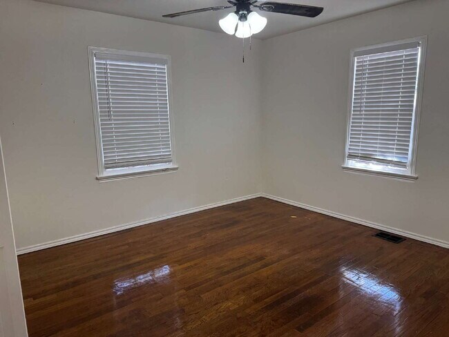Building Photo - "Charming 4-Bed Lubbock Retreat: Granite Kitchen, Hardwood Elegance & Cozy Fireplace!"