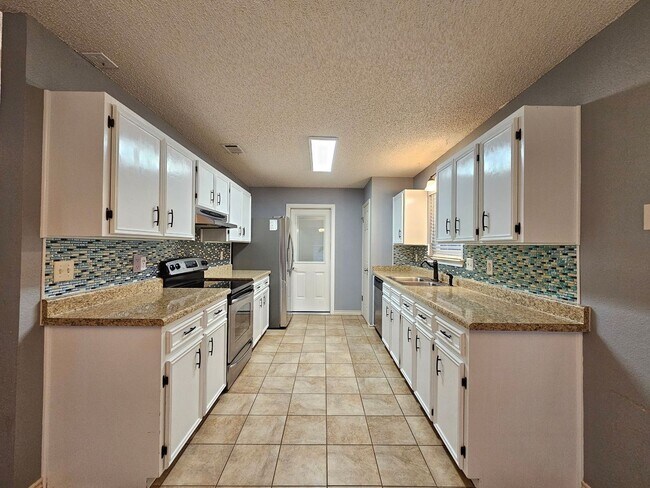 Building Photo - NEW IN MANAGEMENT - AVAILABLE NOW!