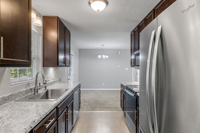 Building Photo - SW - Like New Home! Newer SS Appliances & Cabinets, Ceiling Fans, Blinds, Front Porch and Deck. M...