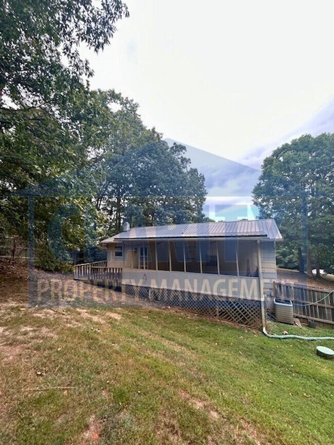 Building Photo - Remodeled three bedroom home on an acre lot!