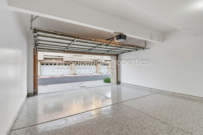 Building Photo - SW!!! 2 Bedroom Condo 1st Floor!! 2 Garage!! Gated!! Community Pool!! Fitness Room!! 2 Primary Be...