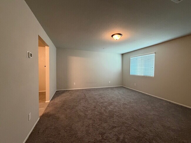Building Photo - GATED 4 BED 2.5 BATH 2 CAR GARAGE SINGLE FAMILY HOME w/ LOFT, BEDROOM DOWNSTAIRS, NEXT TO COMMUNI...