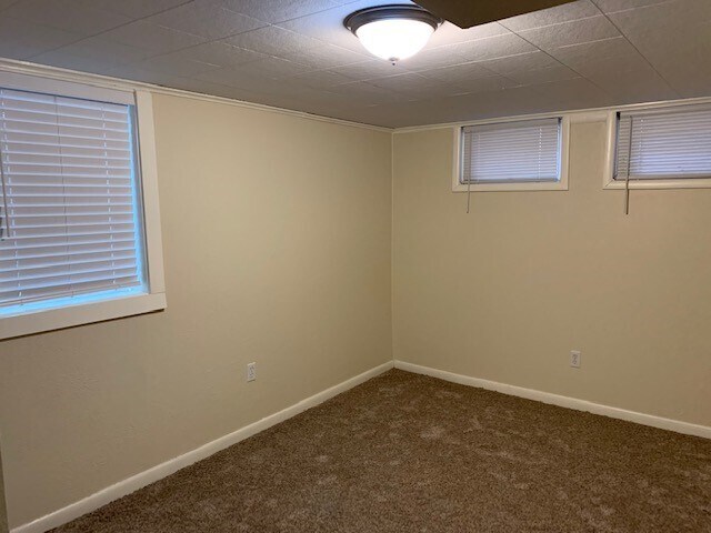 downstairs bedroom w/egress window - 2715 Sunnyview Ln