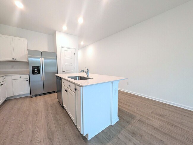 Building Photo - BRAND NEW 3 Bedroom, 2.5 Bath - End Unit - Townhome with Upgrades - located on the Westside - CLO...