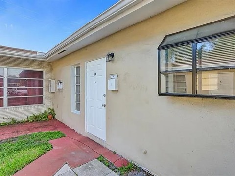 Front door with Kitchen atrium herb window - 1670 NE 56th St