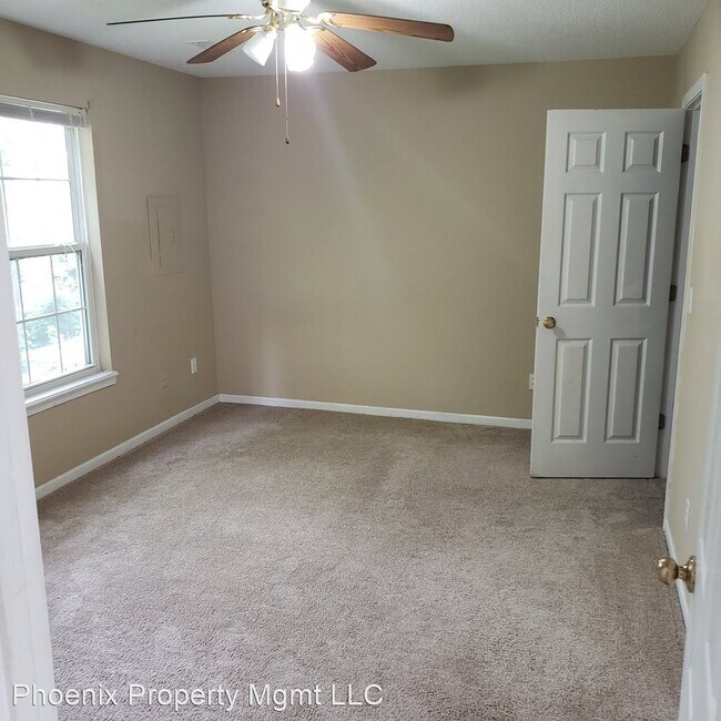 Building Photo - 3409-3411 Squirrel Dr