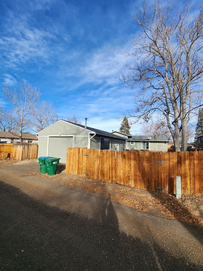Building Photo - Shop-Ready 4BR Home with Lift-Ready Detached Garage & RV Parking Near Downtown Firestone