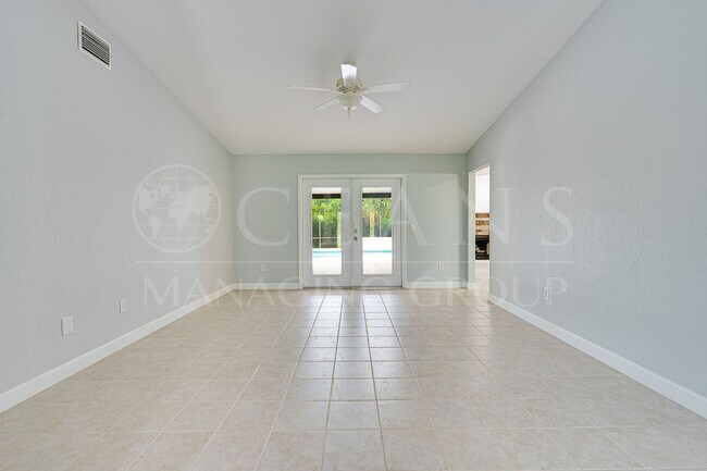 Building Photo - Executive Coastal Retreat | Four-Bedroom P...