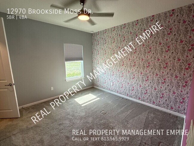 Building Photo - 12970 Brookside Moss Dr