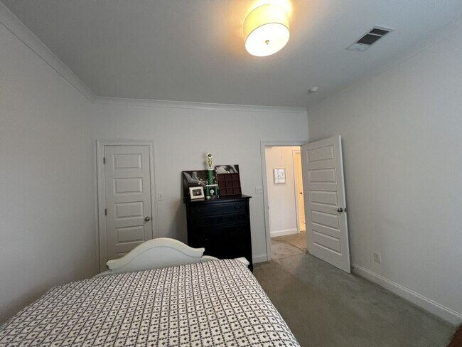 Building Photo - Luxury 4BR Home in Americana | 11 Ft Ceilings, Courtyard Living & Furnished Option at $3,950