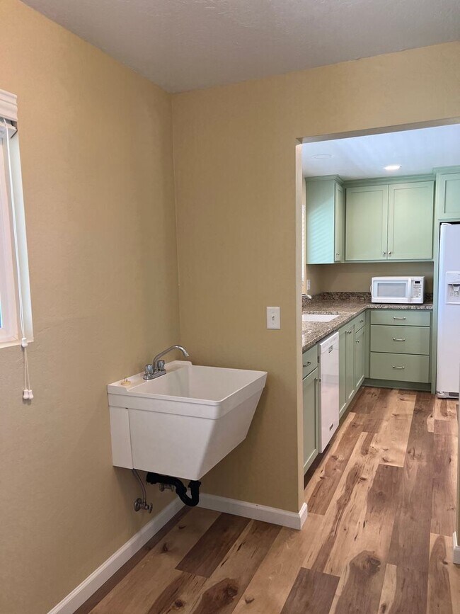 Building Photo - Newly remodeled three bedroom, two bath home - Available Late May