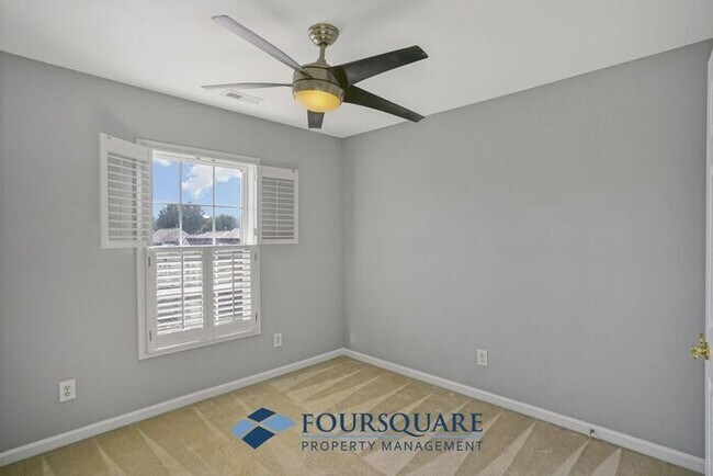Building Photo - Lakefront Townhome with 1st Floor Bedroom, Fireplace & 2-Car Garage – In Raleigh