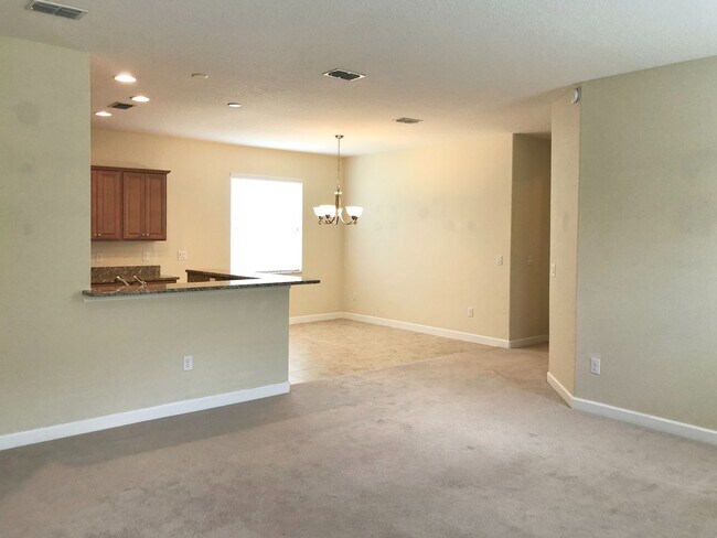 Building Photo - Beautiful 3/2 Spacious Home with a Covered...