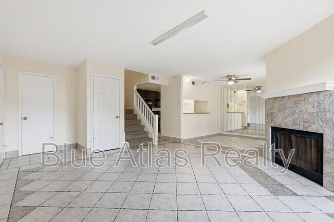 Building Photo - Spring Tree Condos