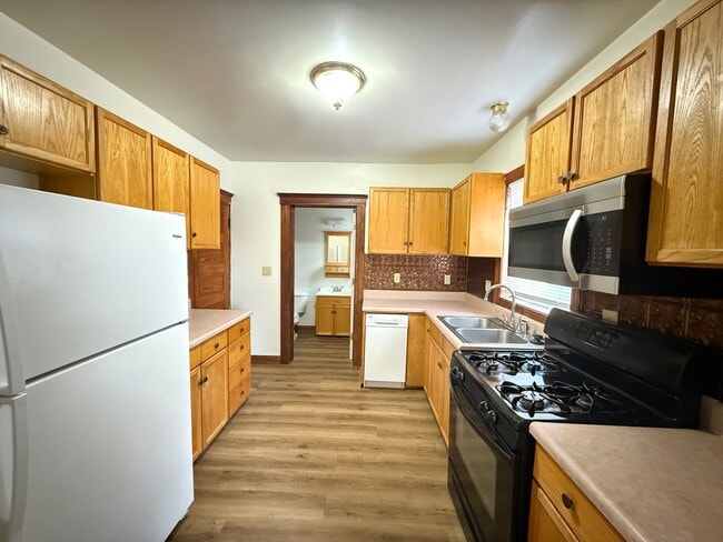 Building Photo - Spacious Historical Three-Bedroom Home with Classic Character- NEW FLOORING