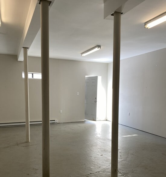 Designated Basement Storage Room to 2nd Floor with with Exit to Fenced in Yard - 312 Birch Dr