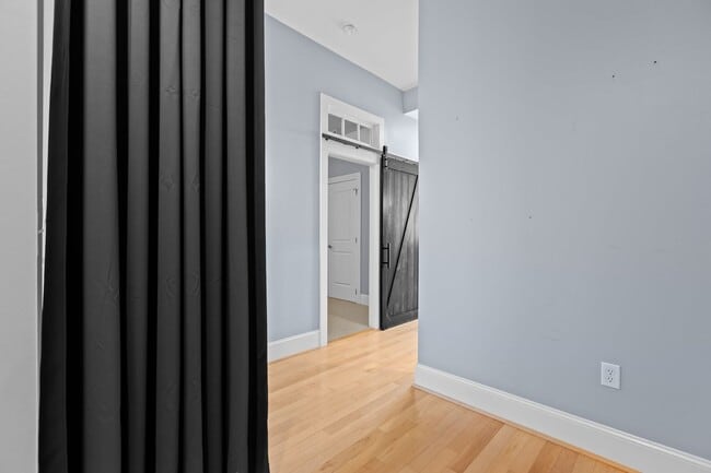 Building Photo - Modern 1-Bedroom with Downtown Raleigh Skyline Views