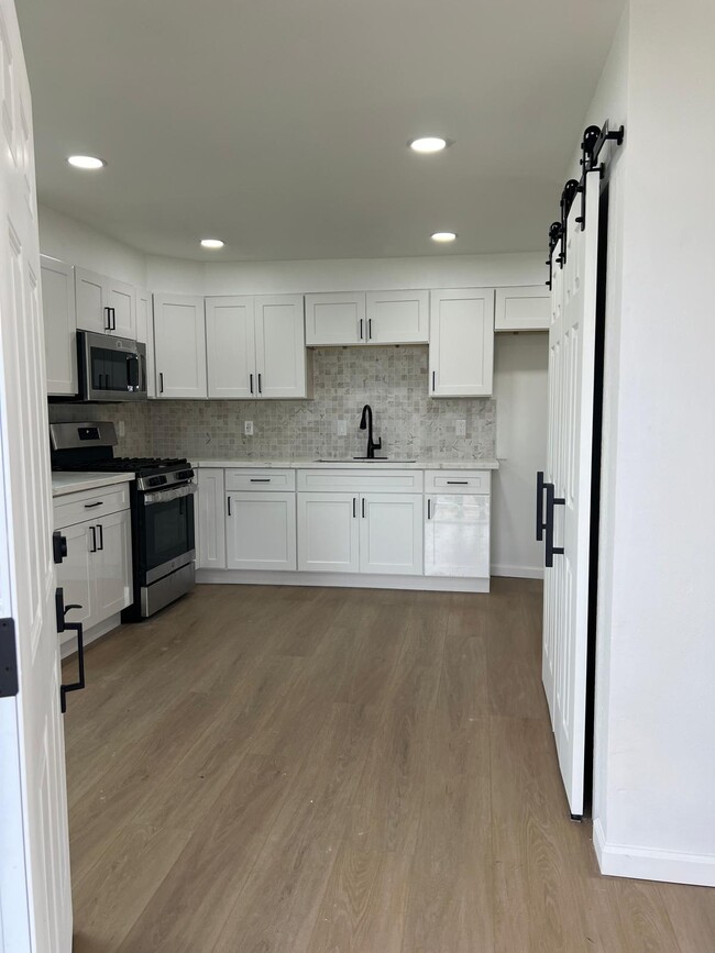 Fully renovated kitchen with soft close technology cabinetry - 212 Wall St