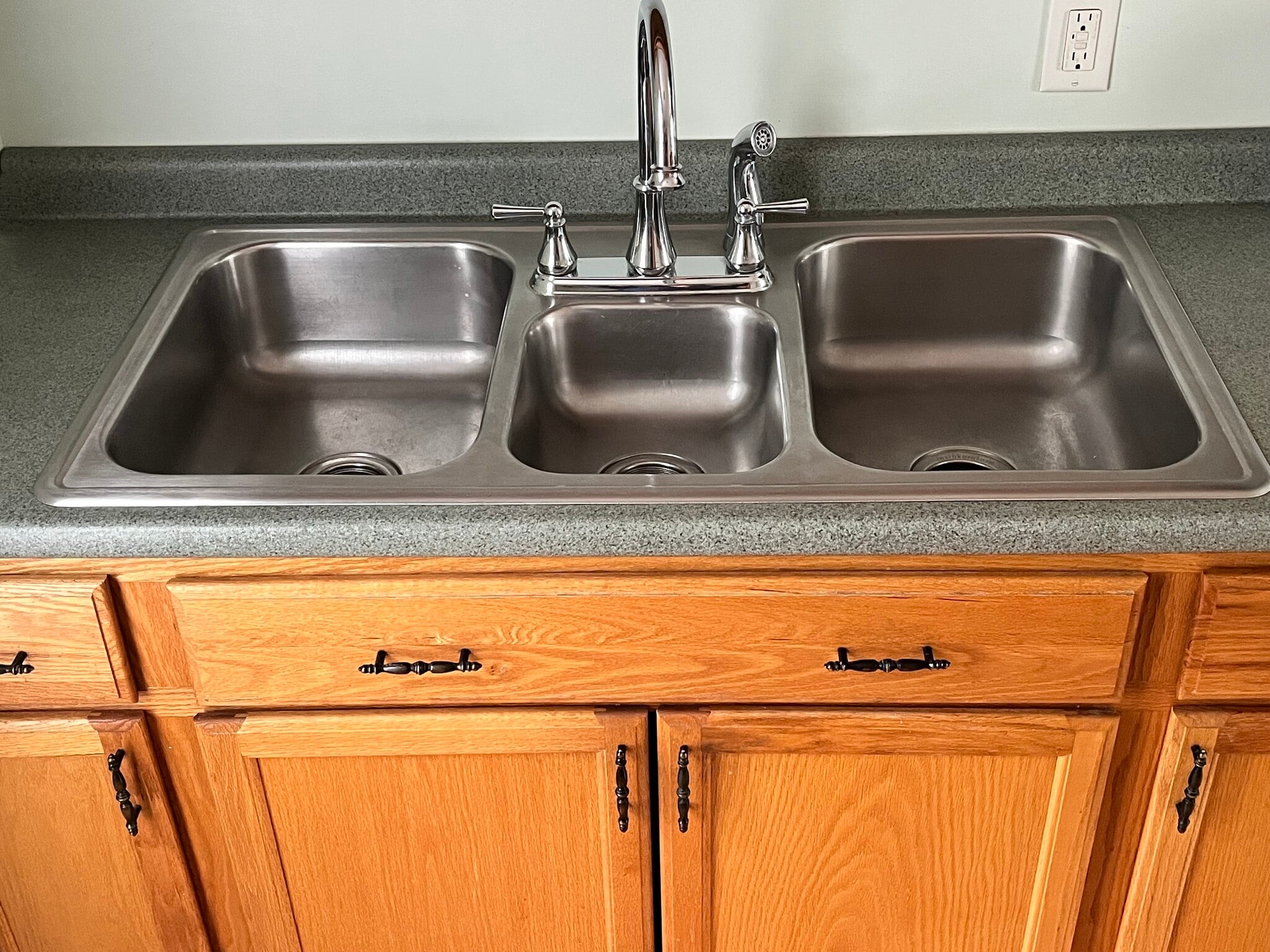 Three bowl sink with disposal - 521 Curtis St