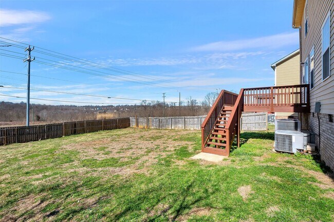 Building Photo - Perfect Family Layout with Office & Large Fenced Backyard