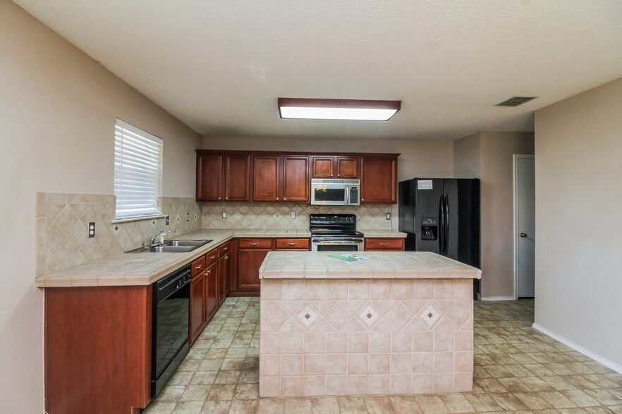 Building Photo - 6601 Swainson Trail