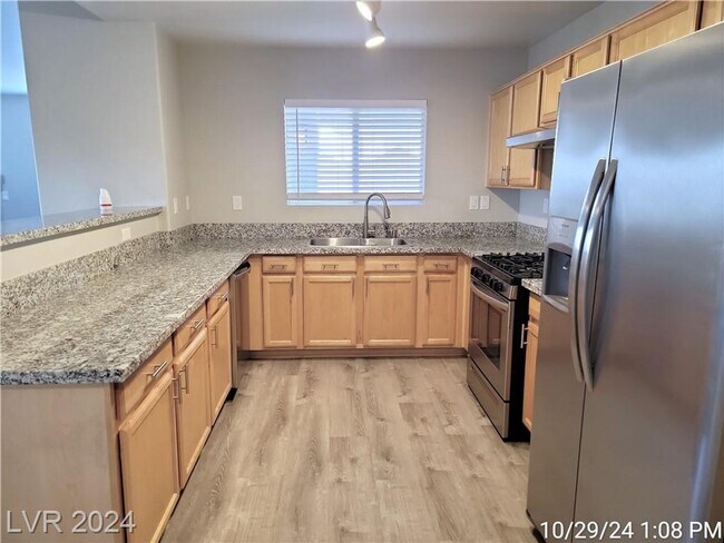 Building Photo - SECOND-FLOOR UNIT IN A GATED SOUTHWEST COM...