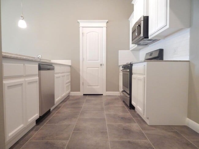 Building Photo - TAKE A LOOK AT YOUR NEW HOME!