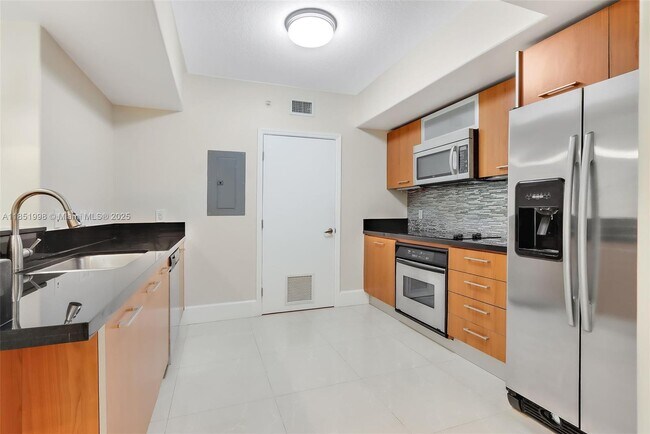 Building Photo - 9055 SW 73rd Ct