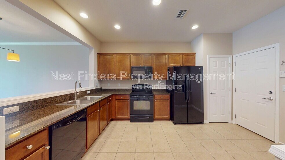 Building Photo - 6937 Woody Vine Dr