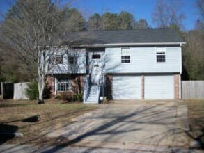 Building Photo - Spacious 4BR Home + Bonus Rooms in Mainstreet Community | Resort-Style Amenities!