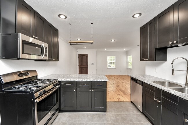 Building Photo - 5118 Ditmas Ln