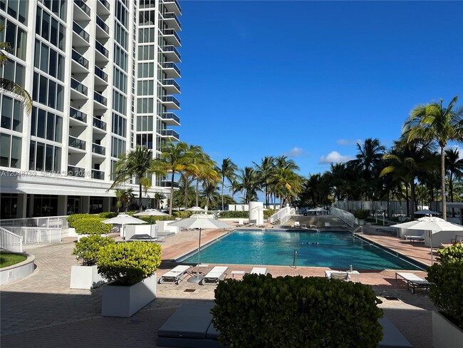 Building Photo - 10275 Collins Ave