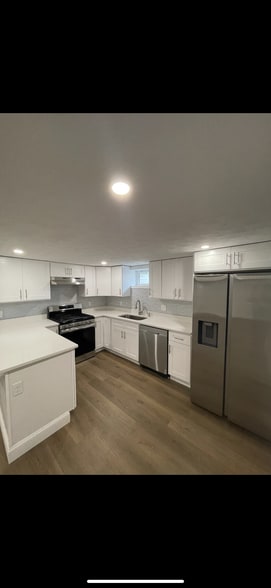 Kitchen is equipped with gas stove, dishwasher, and Samsung refrigerator - 31 Stowers St