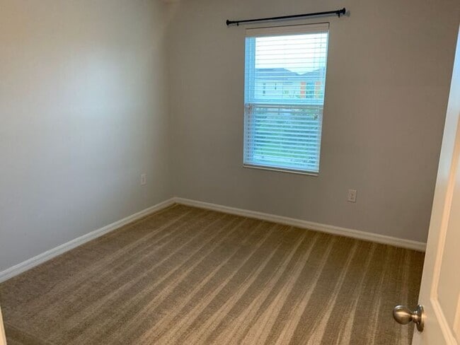 Building Photo - 4 Bedroom Gated Community Compass Bay