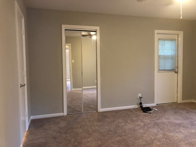 Building Photo - 4 Bedroom / 2.5 Baths / 2 Car Garage with ...
