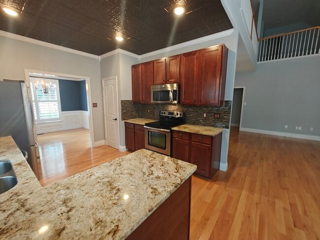Building Photo - 4 bedroom home with a garage on cull de sa...