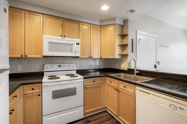 Building Photo - Starter 2 Bedroom with Dedicated Parking Space