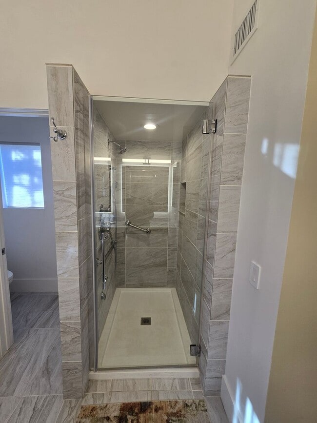 Building Photo - Furnished, 1-Year Long-Term Rental