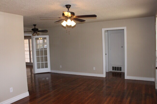 Building Photo - PRE -LEASING FOR AUGUST ! Spacious 4 Bedroom/2 Bath House