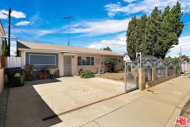 Building Photo - 16711 Mapes Ave