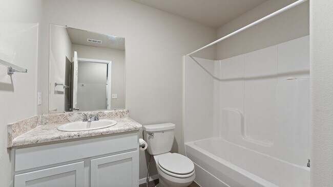 Building Photo - "Charming 4-Bedroom Home with Granite Touc...