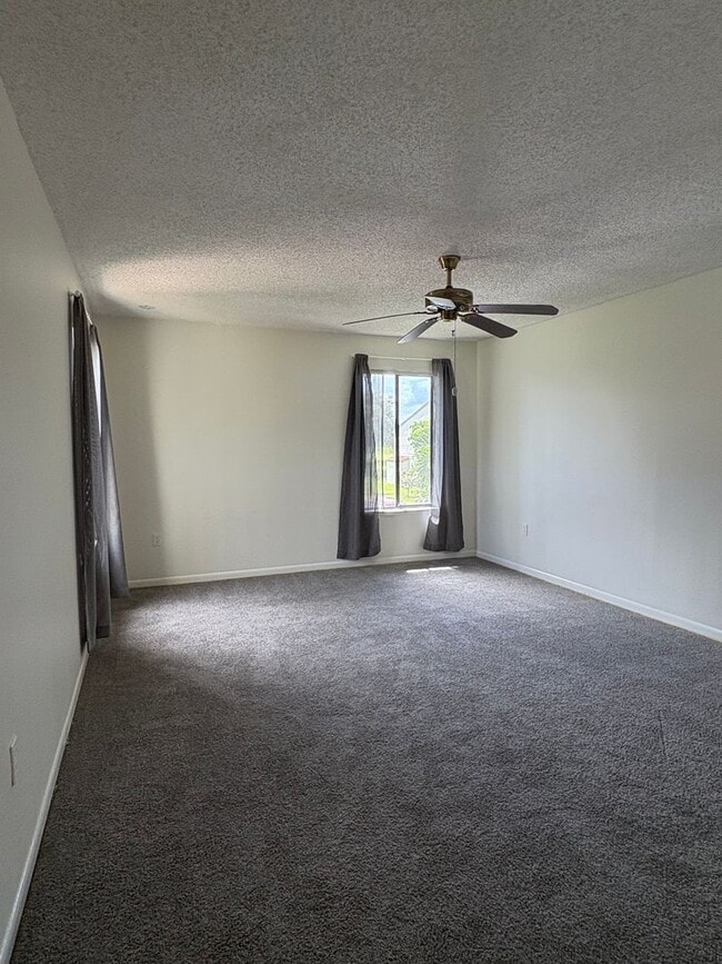 Building Photo - (55+) 2/2 Condo in the Peaceful Miles Grant Golf Course Community