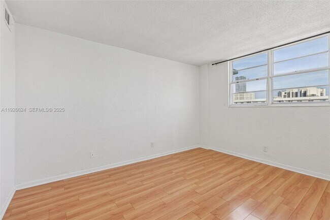 Building Photo - 19390 Collins Ave