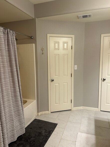 Master bath…Double closets and linen closet - 411 Mason Cir