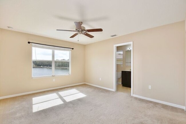 Building Photo - Spacious 3/2.5 End-Unit with Breathtaking Lake Views in Sanford!