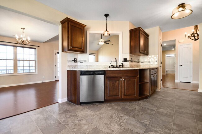 Building Photo - Pet Friendly Three Bedroom with Bonus!