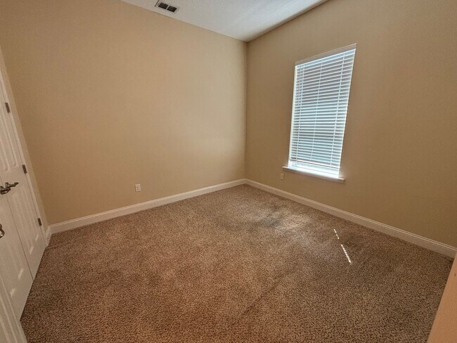 Building Photo - Spacious 4BR/3BA Home with 3-Car Garage, Bonus Office & Covered Patio in St Johns!