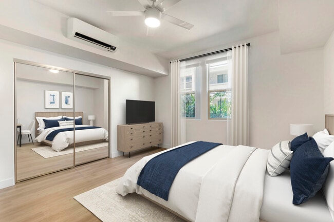 Renovated Package II living area with hard surface flooring - Avalon Wilshire