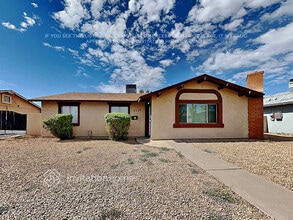 Building Photo - 3319 W Port Au Prince Ln