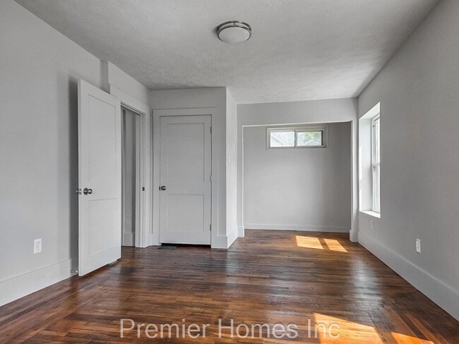 Building Photo - 3 Bed Home with Finished Attic & Hardwood Floors – $1,495/mo